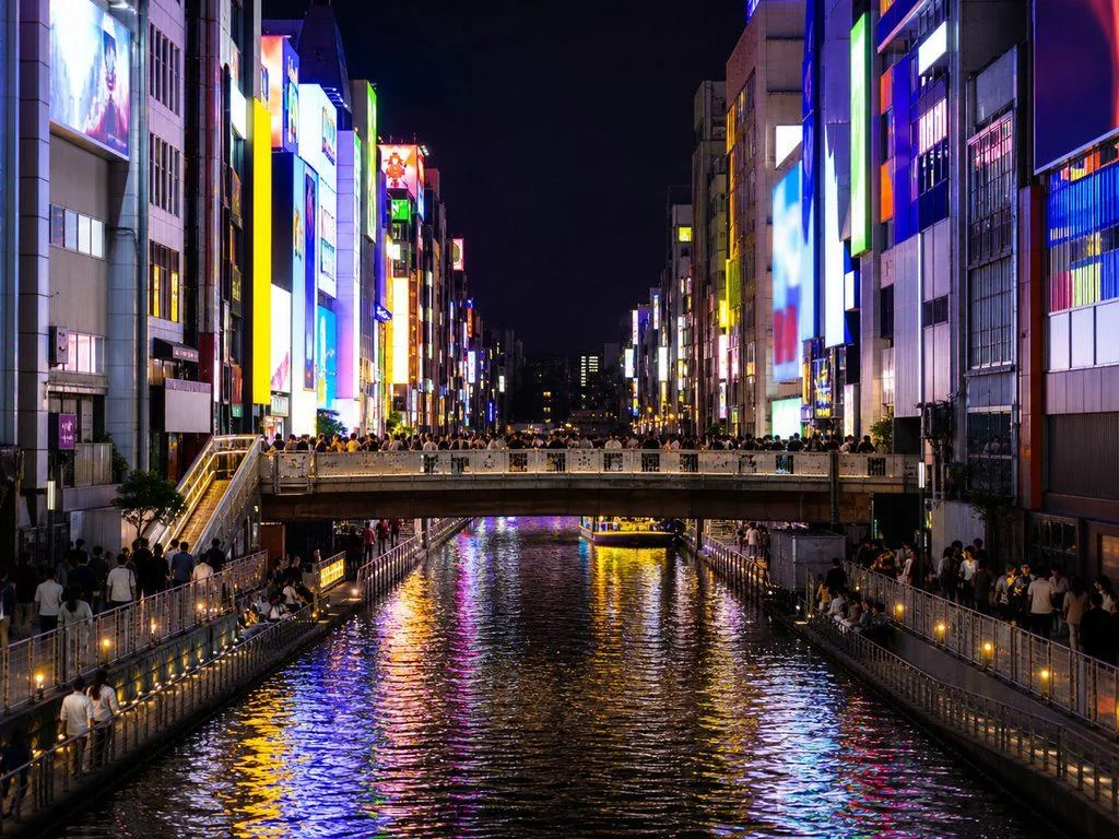 Dotonbori canal at night with the Glico Running Man sign